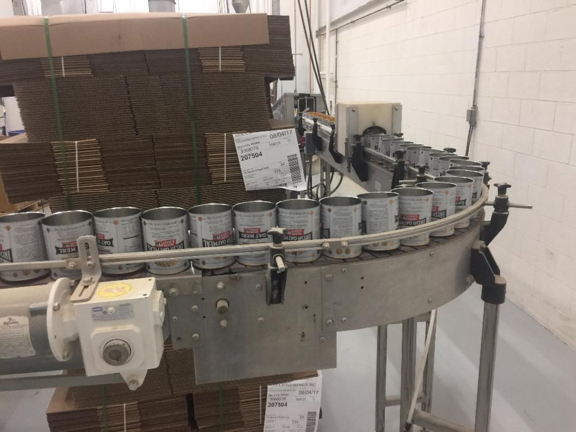 SS empty can conveyor, 16 ft. x 4 1/2 in. table top chain belt, 90 degree turn left, motor and drive