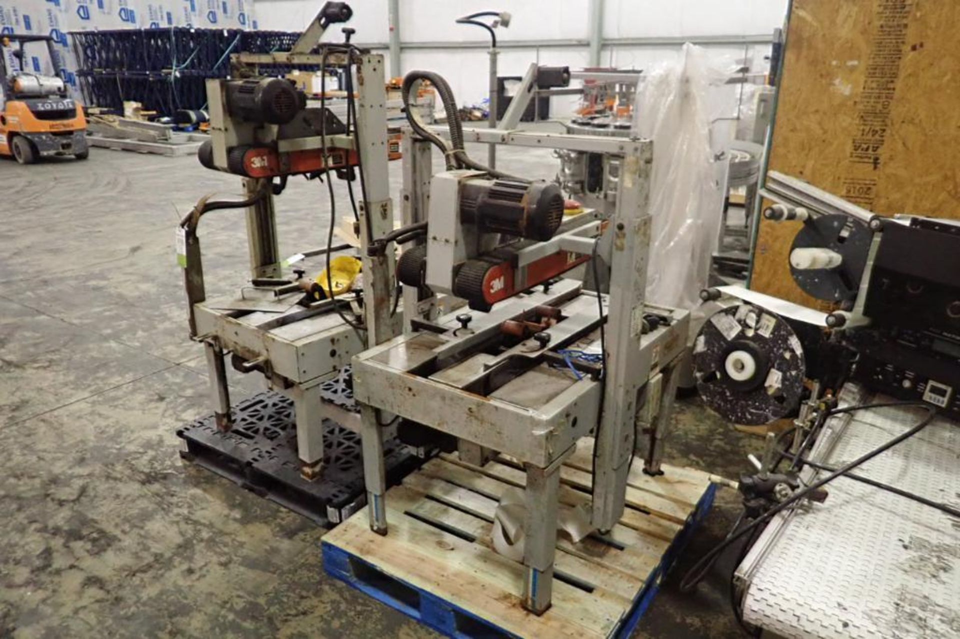 (2) 3M matic adjustable case sealers, top and bottom - ** Located in Dothan, Alabama ** Rigging Fee: