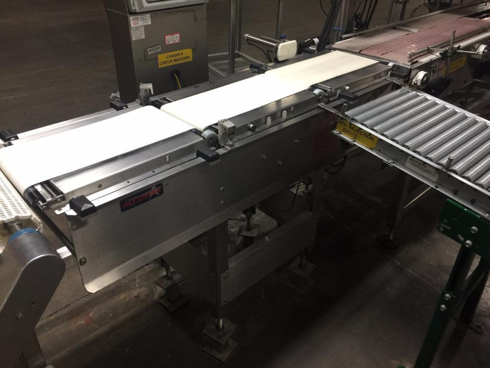 Ramsey Icore high speed checkweigher, model AutoCheck 4000, 9 in. belt motor and drive. - ** Located