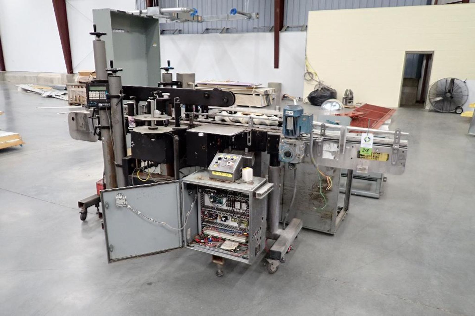 CTM front and back pressure sensitive labeler, conveyor, controls. - ** Located in Buckner, Kentucky