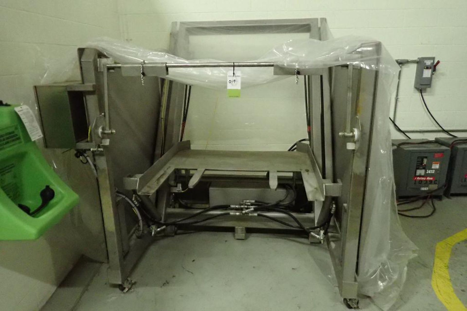 SS hydraulic tote dump with fork pockets {Located in Lancaster, PA}