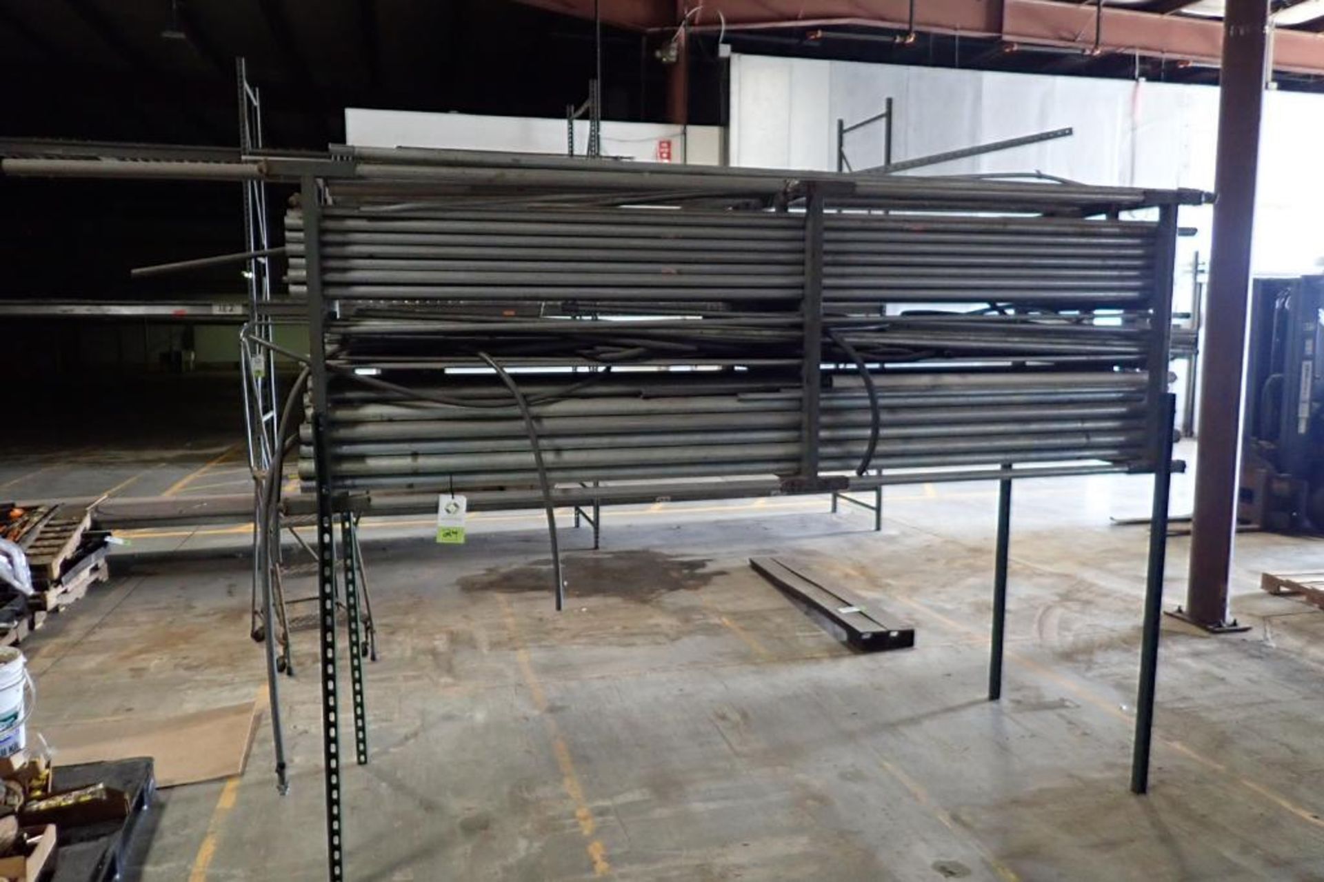 Mild steel rack w/ assorted electrical conduit {Located in Plymouth, IN}