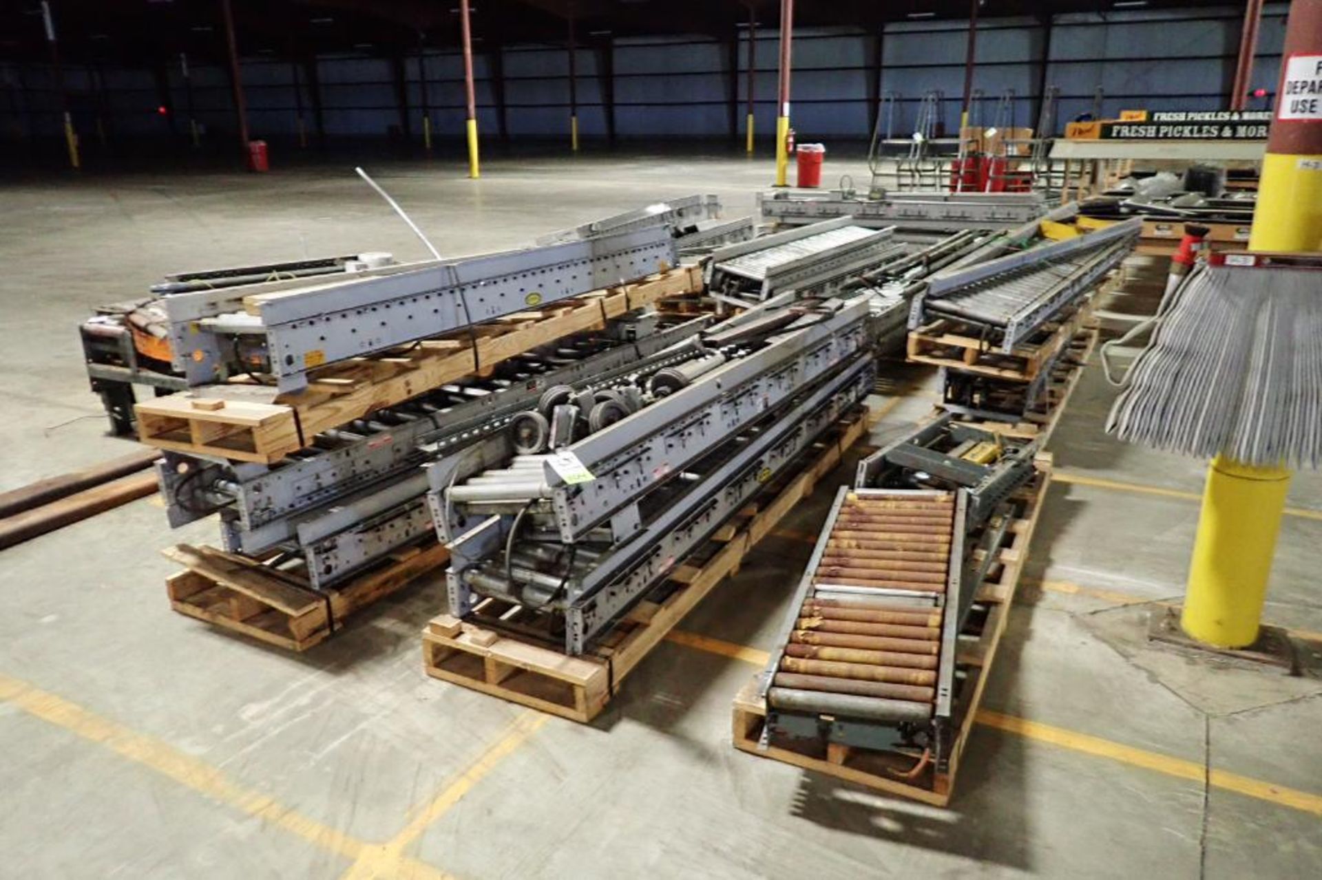 Approx. 180 ft. of Hytrol power roller conveyor {Located in Plymouth, IN}