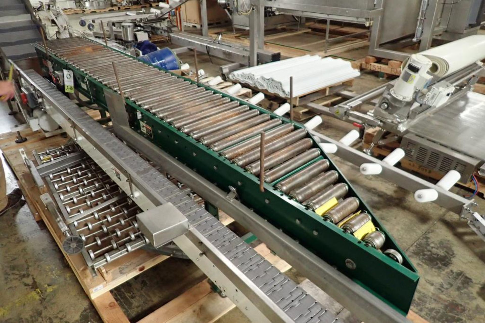 Rapistan merge conveyor {Located in Indianapolis, IN}