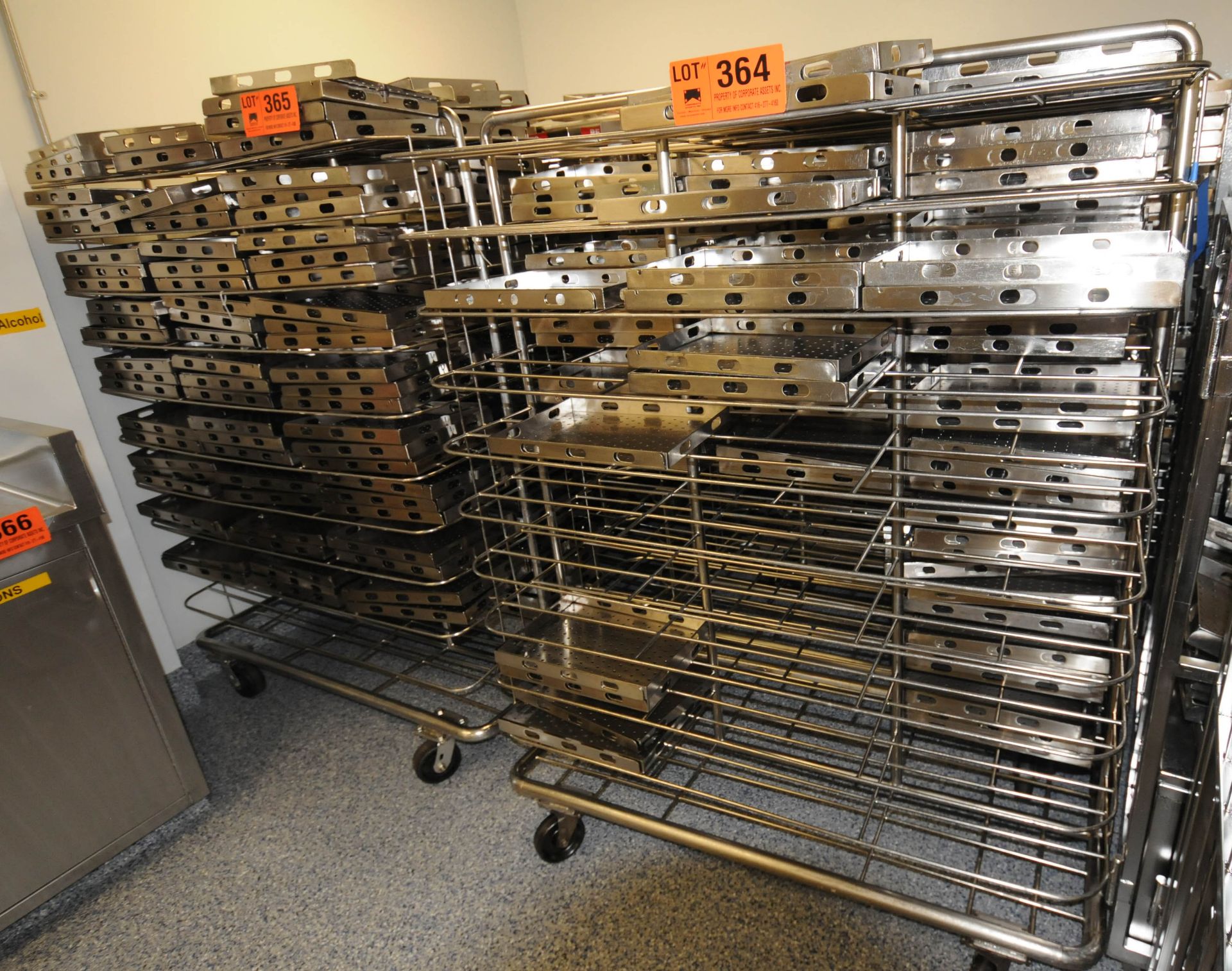 LOT/ 10.5" X 11.5" STAINLESS STEEL TRAYS WITH ROLLING RACKS (RM 322) [LOT 364 - REMOVAL FEE - $50