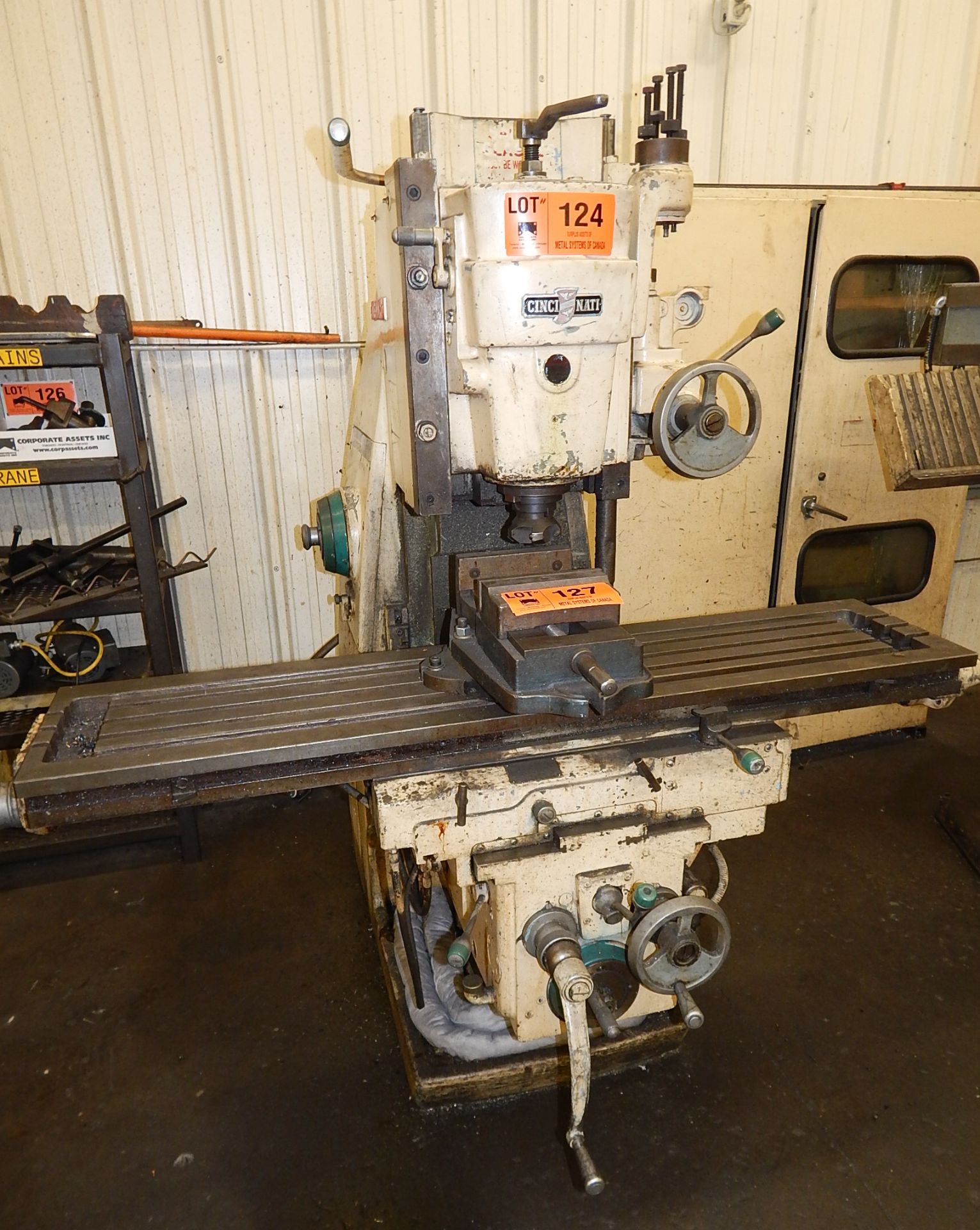 CINCINNATI UNIVERSAL MILL WITH 42" X 14" T-SLOT TABLE S/N: N/A (CI) - RIGGING FEE FOR LOT #124 -