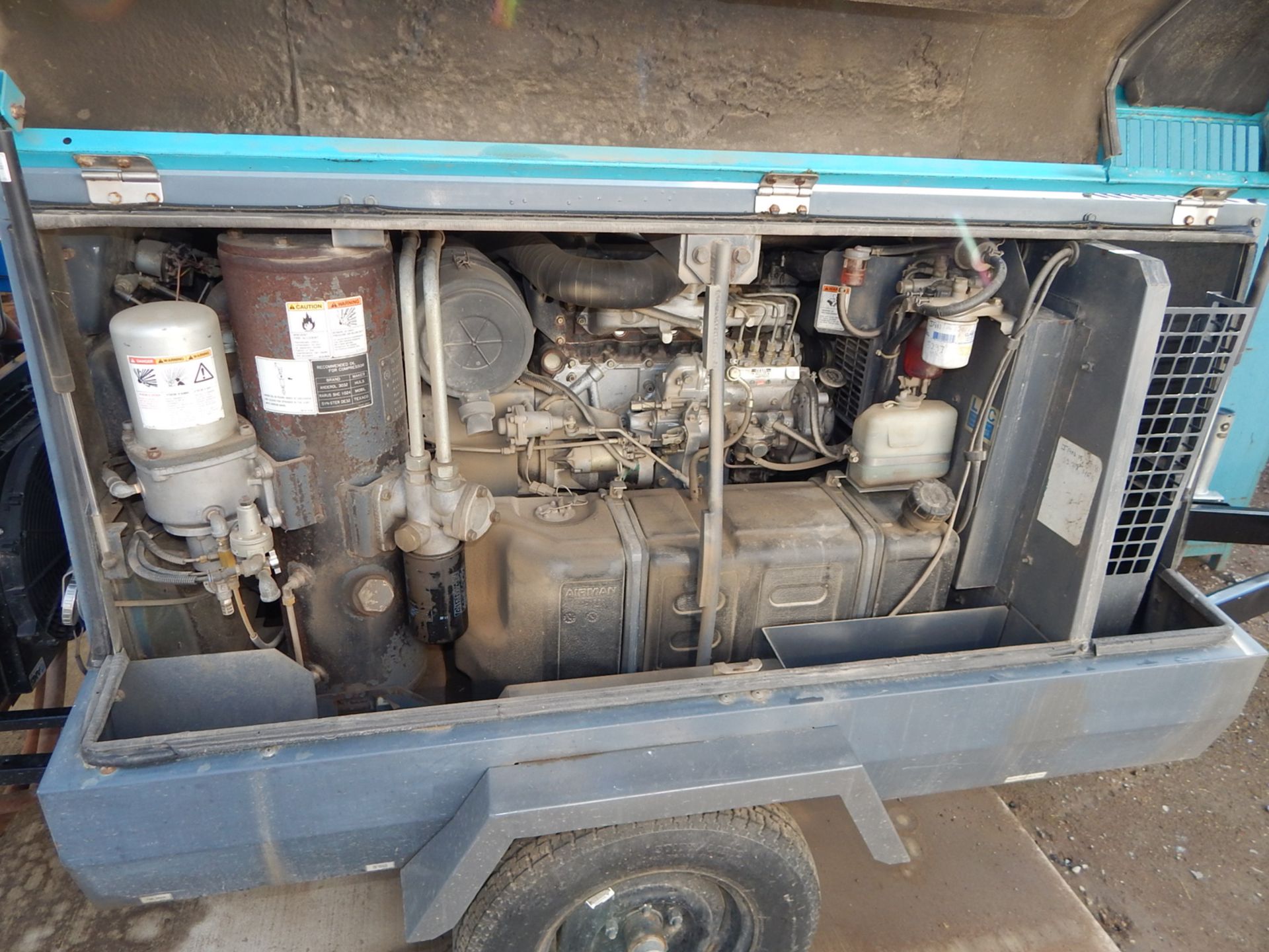 AIRMAN PDS1855S TOW BEHIND TYPE PORTABLE AIR COMPRESSOR WITH NISSAN DIESEL ENGINE, APPROX 5308 HOURS - Image 3 of 4