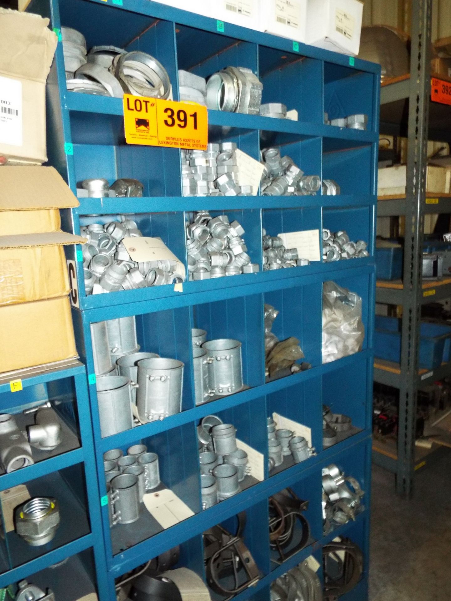 LOT/ PIGEON HOLE CABINETS WITH CONTENTS - ELECTRICAL CONDUIT FITTINGS, HANGERS, BRASS VALVES, PVC