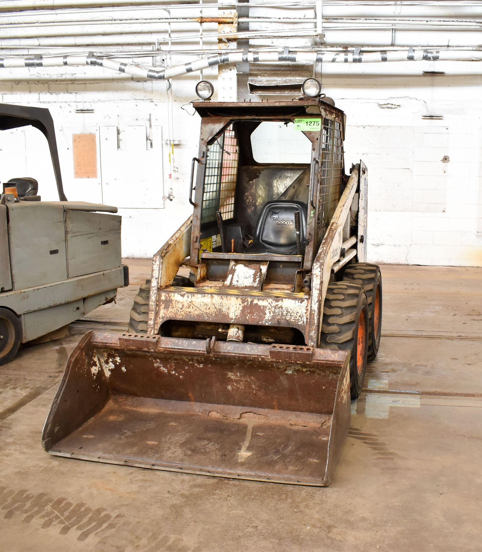 BOBCAT 743 SKID STEER LOADER WITH DIESEL ENGINE, BUCKET ATTACHMENT, PNEUMATIC TIRES, APPROX 3312