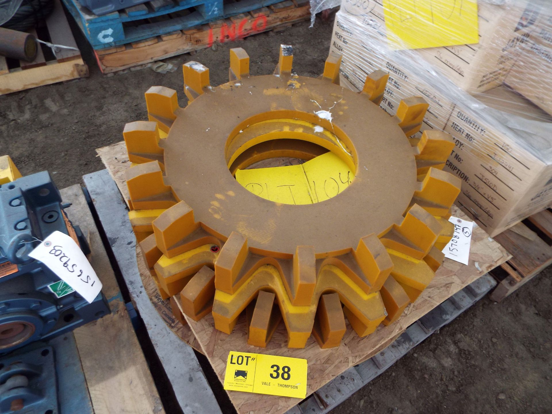 LOT/ CONTENTS OF SKID - (2) MOLDED URETHANE TYPE H1000 GEARS (PLT 104)