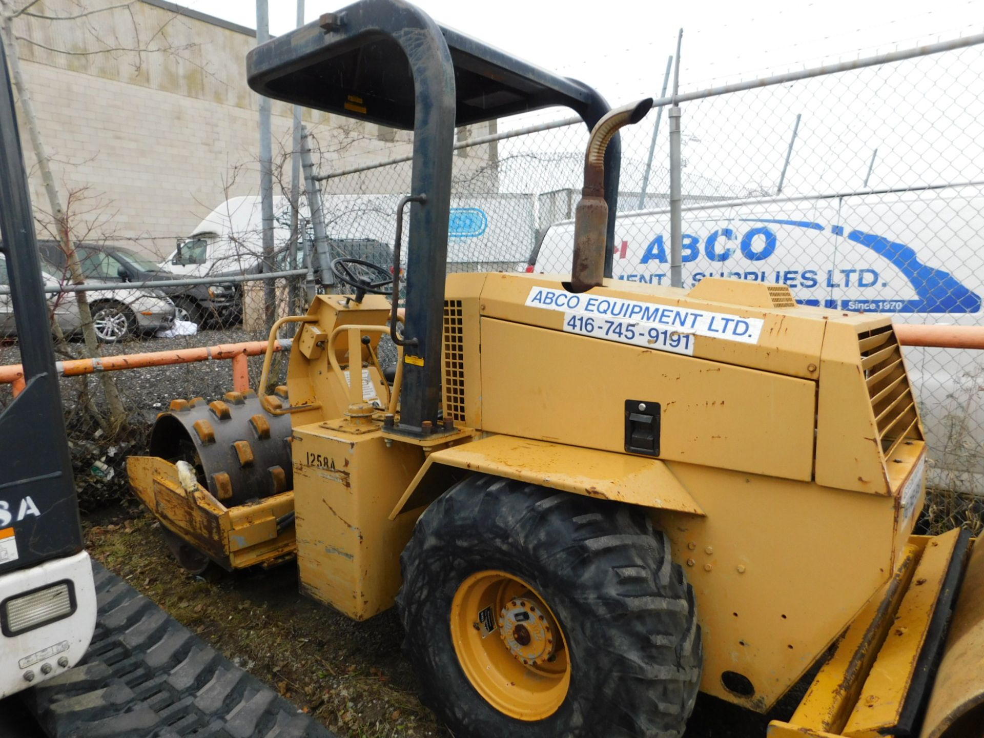 SUPERPAC 540P VIBRATORY ROLLER WITH DIESEL ENGINE, 54" WIDE WET ROLLER, 2071 HOURS (RECORDED ON