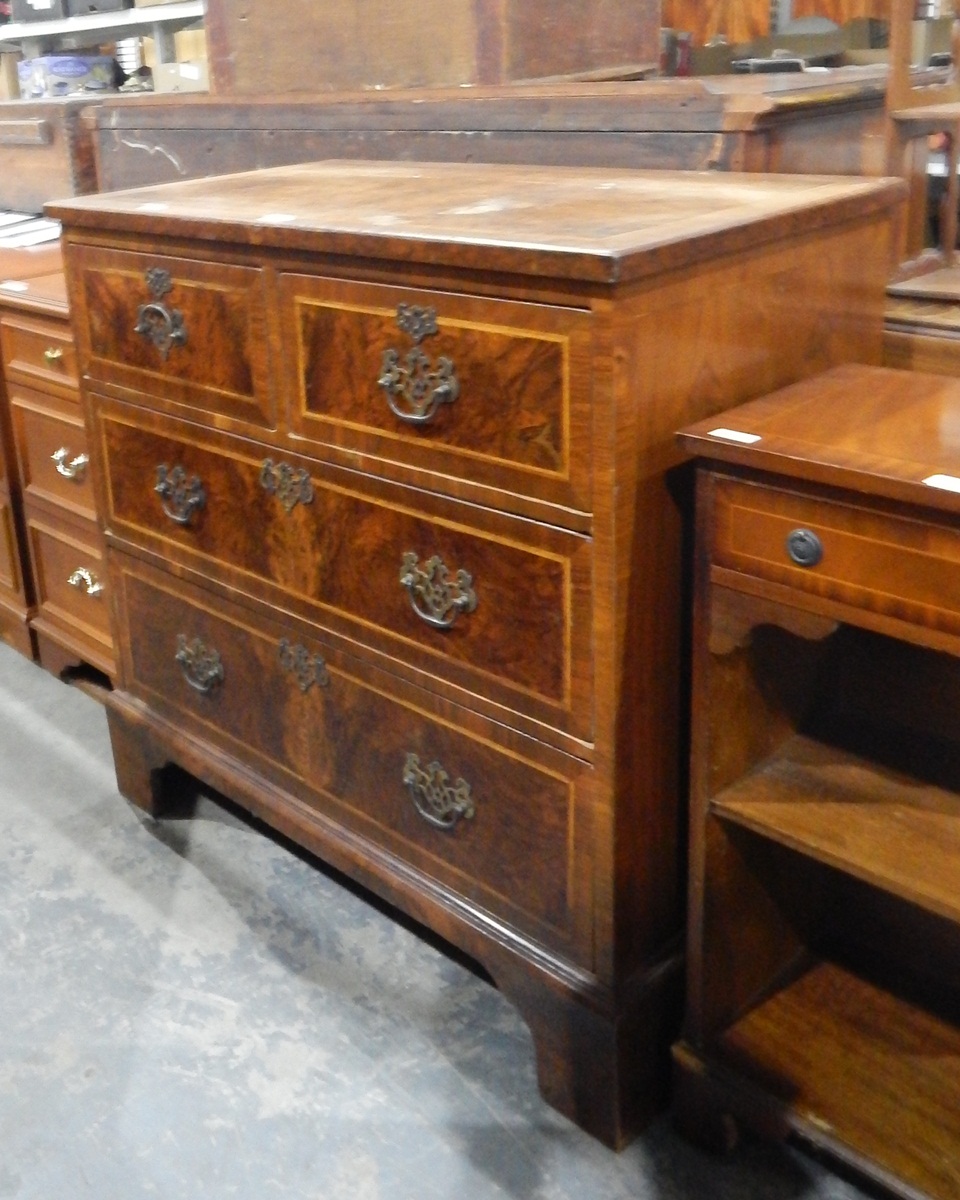 19th century mahogany and walnut veneer chest of two short and two long drawers,