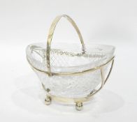 Late 19th century glass basket with silver stand, on ball feet, Sheffield 1884,