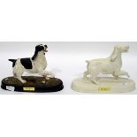 Two Beswick 'The Spaniel' in white bisque and tinted bisque,