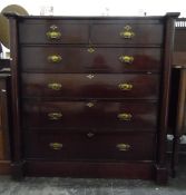 Victorian mahogany chest of two short and four long graduated drawers, flanked by columns,