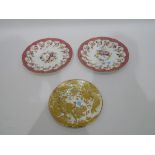 Pair of 19th century porcelain plates, pink bordered, painted floral swags to centre and border, 25.