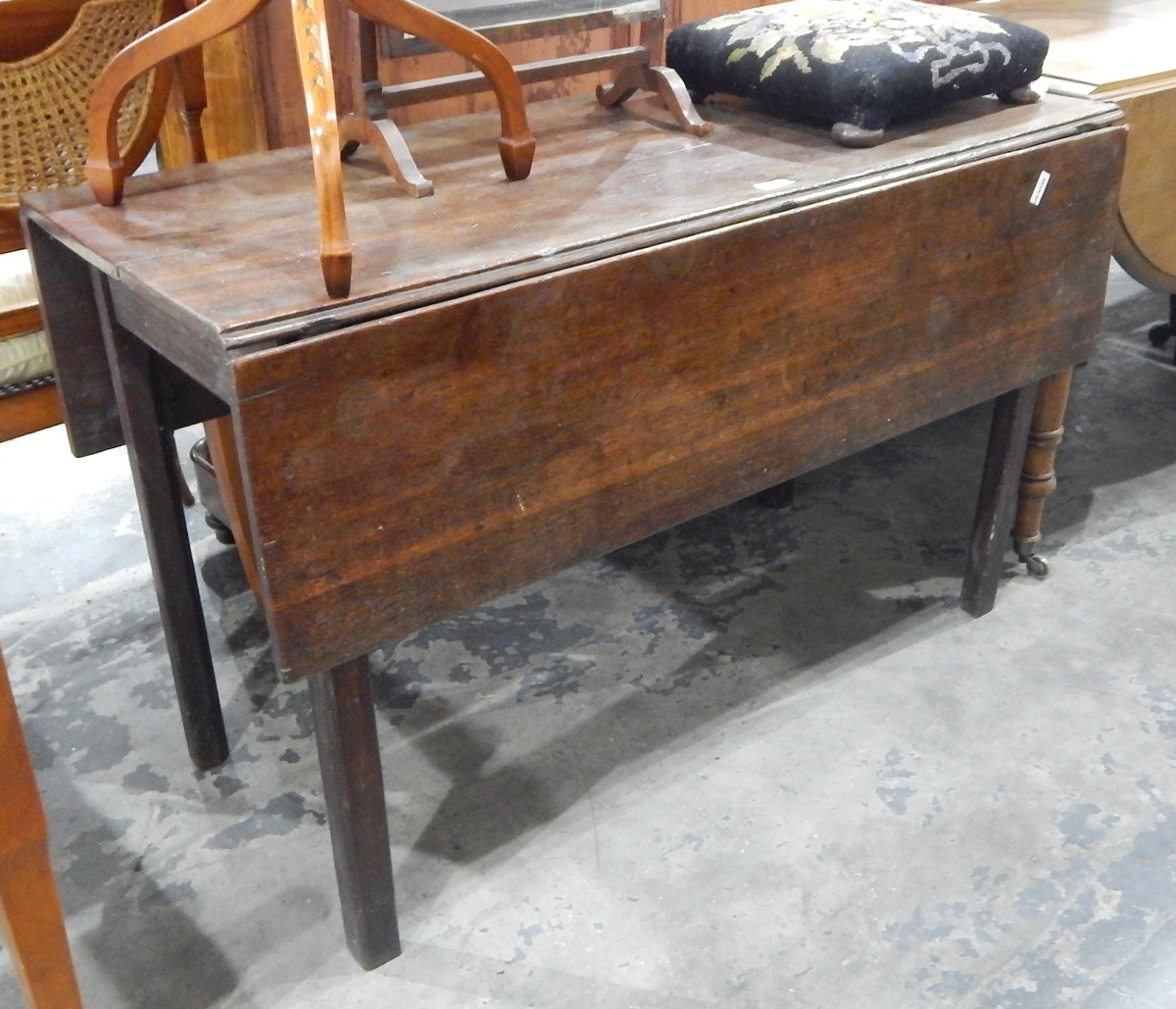 Georgian oak drop-leaf table of plain rectangular form,