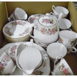 Colclough Bone China part tea service, white bordered with pink honeysuckle and dog roses,