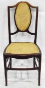 Edwardian inlaid mahogany and cane chair