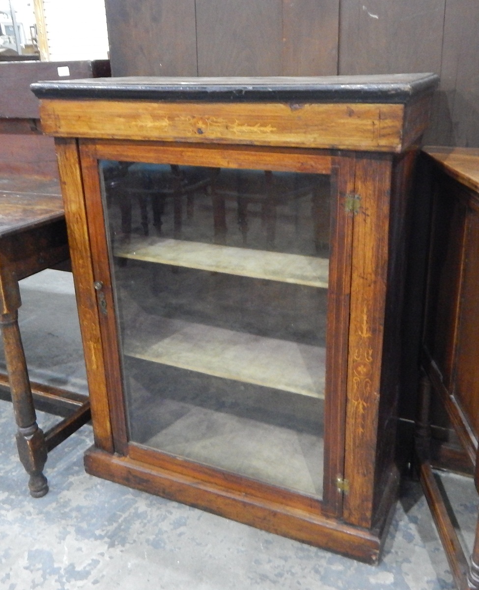 Victorian walnut cabinet with ebonised and inlaid decoration,