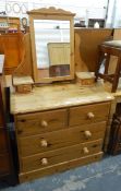 Pine dressing chest, the swing toilet mirror flanked by two small drawers,