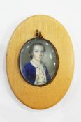 18th century portrait miniature on ivory of a young man in a blue coat,