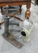 Metal pump on a wooden base and two metal watering cans (3)