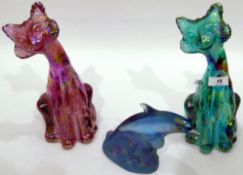 Two Fenton carnival glass cats, one in iridescent turquoise, with sticker, 29cm high,