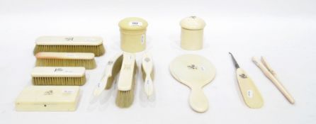 Late 19th/early 20th century ivory backed dressing table matched set to include clothes brushes,