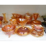 Large marigold carnival glass biscuit barrel and cover,