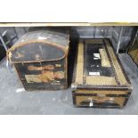 Two large vintage travelling trunks and a leather domed lidded travel trunk with various shipping