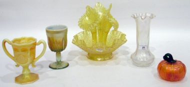 Yellow carnival glass epergne, the circular wavy-rimmed bowl fitted with three removable trumpets,