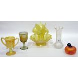Yellow carnival glass epergne, the circular wavy-rimmed bowl fitted with three removable trumpets,
