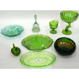 Quantity of green pressed glass and green carnival glass including an oval dish decorated with