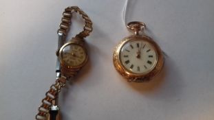 Lady's 15ct gold fob watch in foliate engraved case,