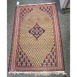 Iranian Kelim with central floral midnight blue lozenge, on a beige ground, with geometric motifs,