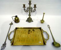 Quantity of brass and copperware including shallow copper pans, a brass trivet, a brass candelabrum,