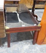 Glazed display coffee table of plain rectangular form with brass mounts