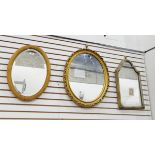 Two oval modern gilt framed mirrors,