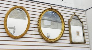 Two oval modern gilt framed mirrors,