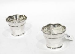 Near pair of early 20th century silver bowls with wavy beaded rim, tapered body,