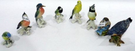 Six bird models by Karl Ens including a kingfisher, a bluetit,