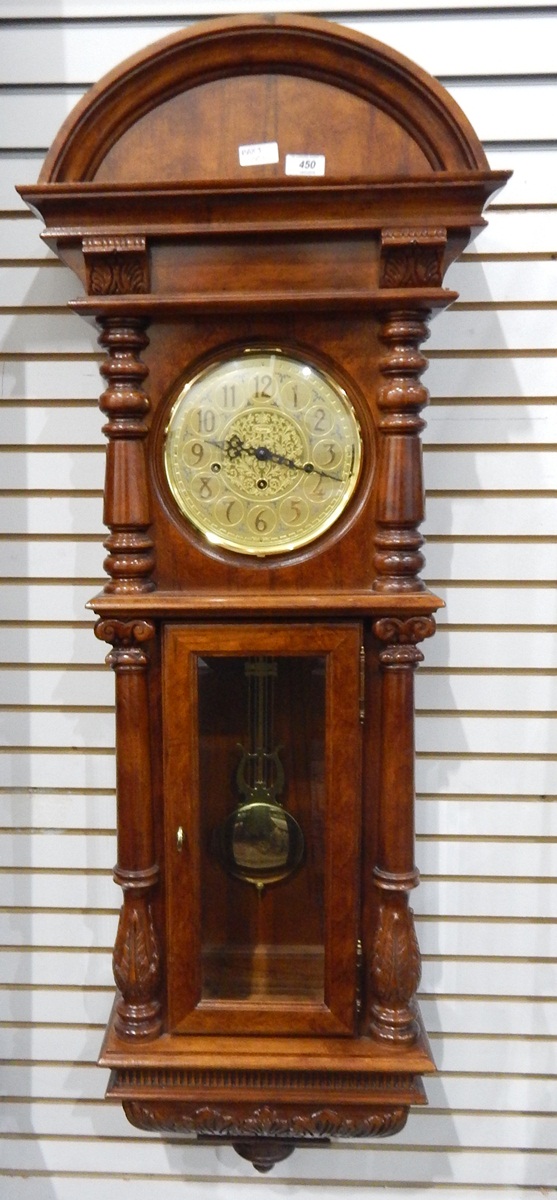 Ridgway New England reproduction mahogany wall clock with arched pediment,