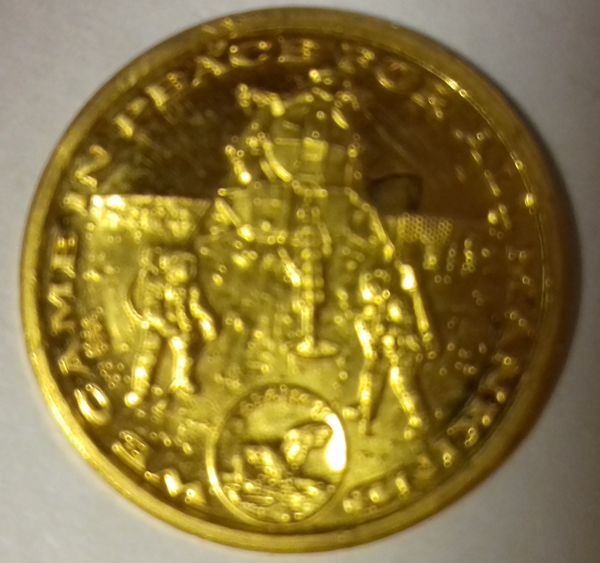 Gold commemorative 'Moon Landing' coin,