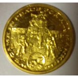 Gold commemorative 'Moon Landing' coin,