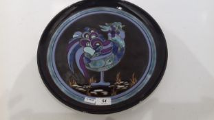 Poole pottery 'Ionian' plaque by S M Pottinger with stylised polychrome cockerel on a brown ground,