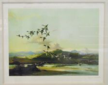 After Vernon Ward Colour print Ducks in flight over lowland landscape,