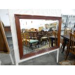 Modern mahogany framed mirror with rectangular stepped frame, the mirror with bevelled edge,