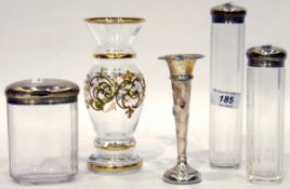 Three early 20th century silver-topped cut glass toilet jars,