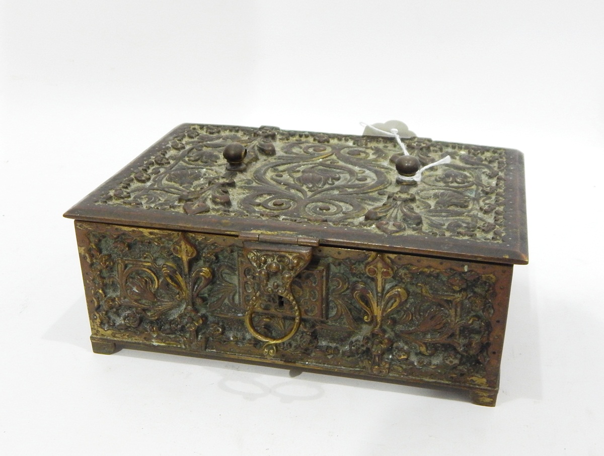 Early 20th century brass lidded jewellery box, the hinged lid with floral relief decoration,